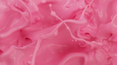 Pink paint splashes, abstract background, freeze motion.