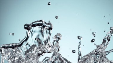 Abstract crown shape of water splash on blue background, studio shot