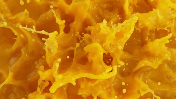 Closeup Splashing Orange Juice Top View — Stock Fotó
