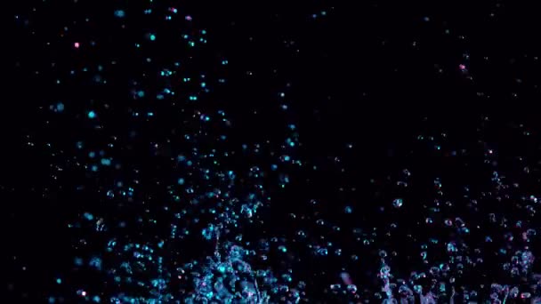 Super Zeitlupe Von Plätscherndem Wasser Beleuchtet Von Neonlichtern Gefilmt Mit — Stockvideo