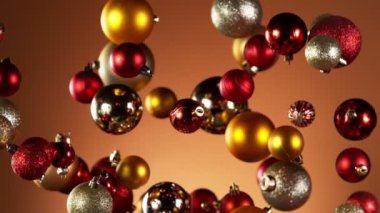 Renkli arka planda izole edilmiş uçan noel toplarının süper yavaş çekimi. Yüksek hızlı sinema kamerası, 1000 fps..