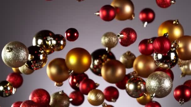 Super Slow Motion Flying Christmas Balls Isolated Colored Background Filmado — Vídeo de Stock