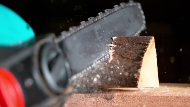 Super Slow Motion Detail Chainsaw Cutting Wood Filmed Very High — Stock Video