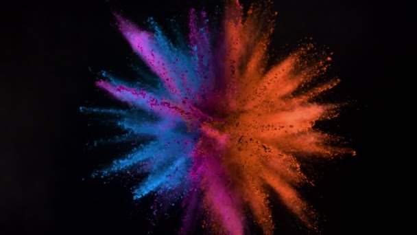 Super-Zeitlupe farbigen Pulvers Explosion isoliert auf schwarzem Hintergrund. Gefilmt mit High-Speed-Kinokamera, 1000fps.