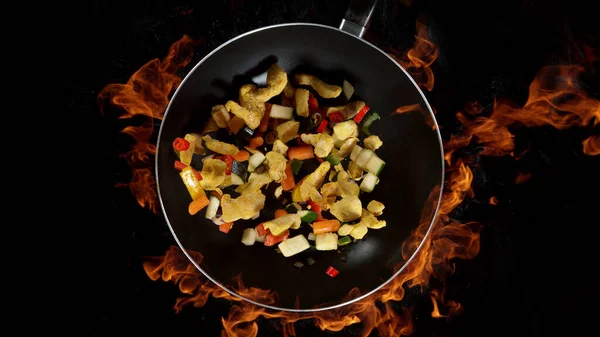 Asian Chicken Mix Wok Pan Flames Background High Angle View — Stock Photo, Image