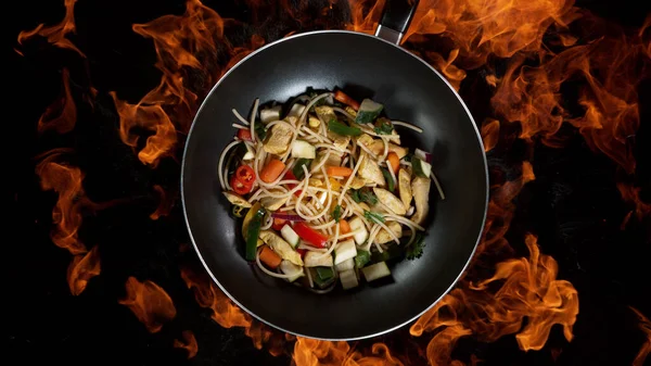 Asian Noodles Wok Pan Flames Background High Angle View Meat — Stock Photo, Image