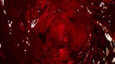 Kameralı kırmızı şarabın süper yavaş çekimleri. Yüksek hızlı sinema kamerası, 1000 fps..