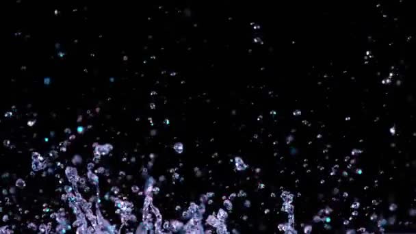 被霓虹灯照亮的水花的超级慢速运动 用高速摄像机拍摄 每秒1000帧 — 图库视频影像