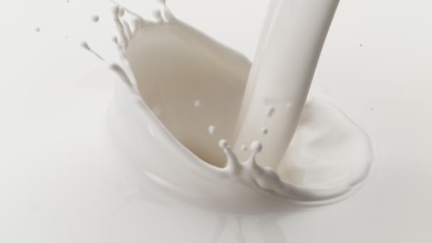 Super Slow Motion Pouring Milk Splash Filmed High Speed Cinema — Stock Video