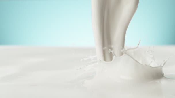 Super Slow Motion Pouring Milk Soft Blue Background Filmed High — Stock Video