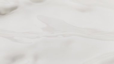 Makro çekimde süt sıvısı sallamak çok yavaş bir hareket. Yüksek hızlı sinema kamerası, 1000fps.