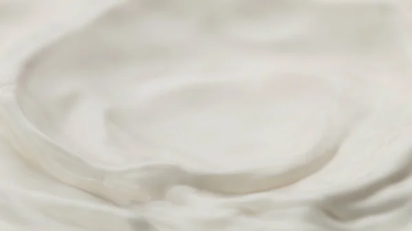 Milky abstract wavy background, dairy cream or whipped cream mixing.