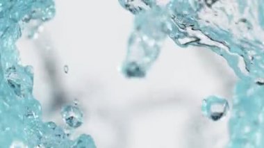 Su sıçratmada süper yavaş çekim, yakın çekim. Yüksek hızlı sinema kamerası, 1000 fps..