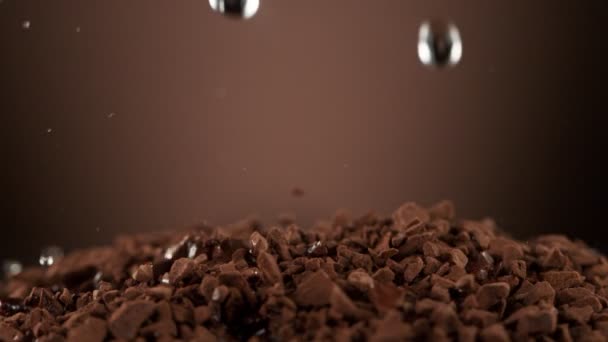 Super Slow Motion Dripping Drops Instant Coffee Pile Filmed High — Stock Video