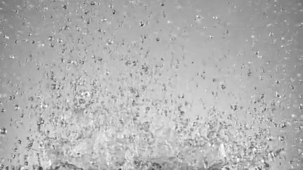 Super Slow Motion Splashing Water Isolated Grey Background Filmed High — Stock Video