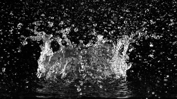 Zastavit Pohyb Vody Stříkající Izolované Černém Pozadí — Stock fotografie