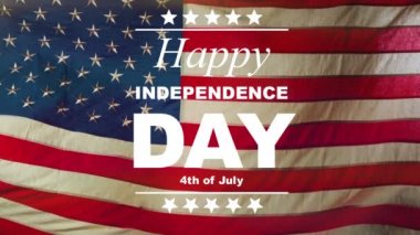 Super slow motion of waving flag of USA with Independence Day text. Filmed on high speed cinema camera, 1000fps.