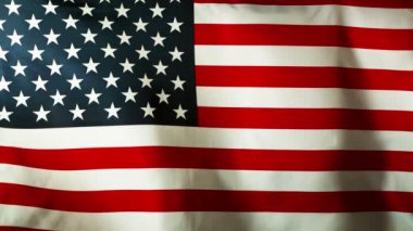 Super slow motion of waving flag of USA in close-up. Filmed on high speed cinema camera, 1000fps.