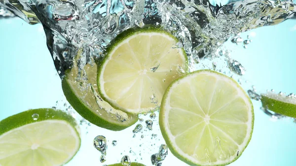 Fresh Lime Dropped Water Splash Studio Shot Clear Background — Stock Photo, Image