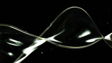 Siyah arka planda çok yavaş sıçrayan yağ döngüsü. Yüksek hızlı sinema kamerası, 1000 fps..