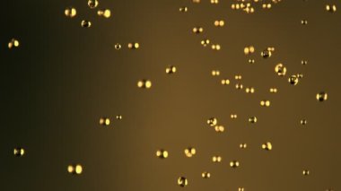 Düşen yağın, viskinin ya da konyağın çok yavaş etkisi. Yüksek hızlı sinema kamerası, 1000fps.