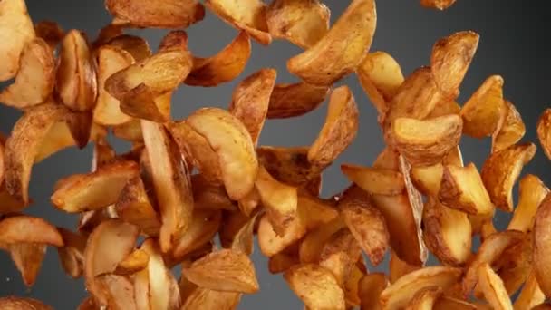 Super Slow Motion Flying Fried American Potatoes Black Background Inglês — Vídeo de Stock