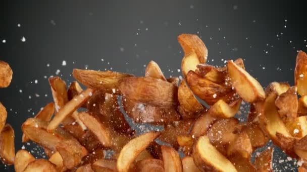 Super Slow Motion Flying Fried American Potatoes Black Background Inglês — Vídeo de Stock