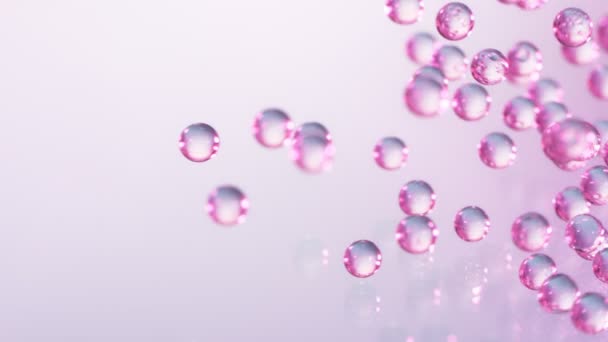 Super Langzame Beweging Van Vallende Roze Blauwe Hydrogel Ballen Cosmetisch — Stockvideo
