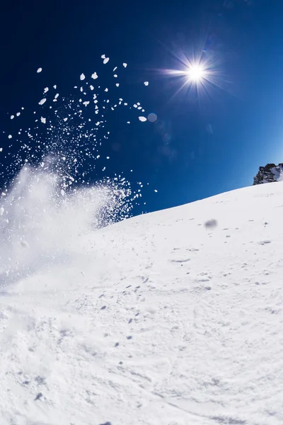 Freeze motion of powder snow blasting out — Stock Photo, Image