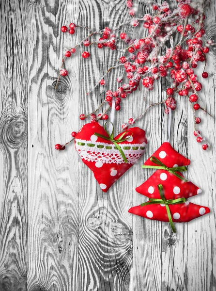Hand made traditional christmas decoration on wood — Stock Photo, Image