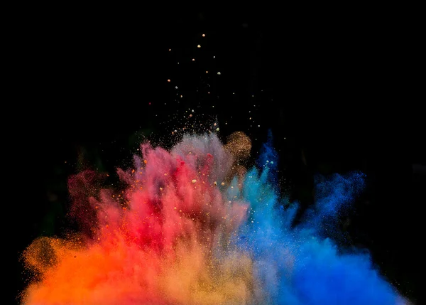 Colored dust explosion on black background — Stock Photo, Image