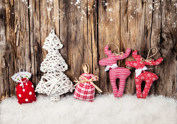 Hand made traditional christmas decoration on wood — Stock Photo, Image