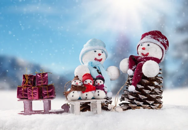 Winter snowy scenery with snow men — Stock Photo, Image