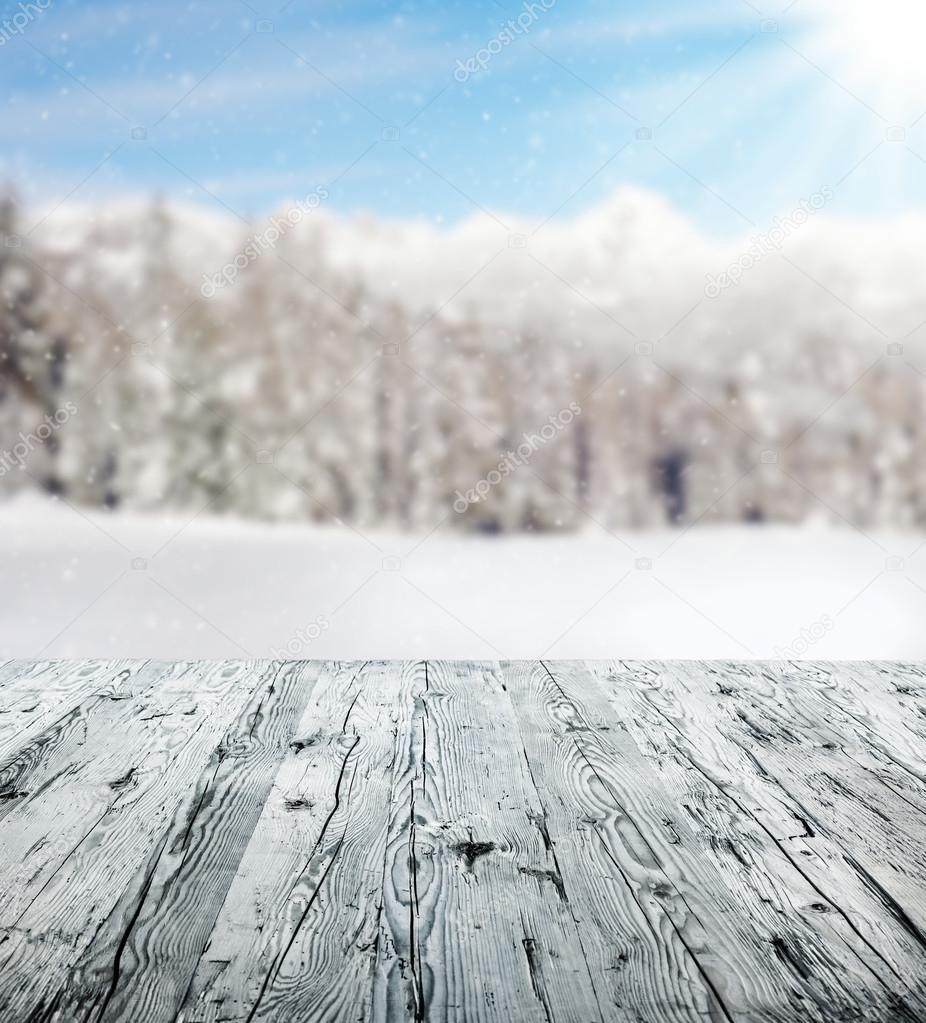 Winter scenery with wooden planks