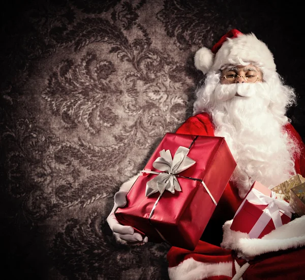 Santa Claus with gifts — Stock Photo, Image