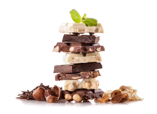 Pile of hazelnut chocolate on white background