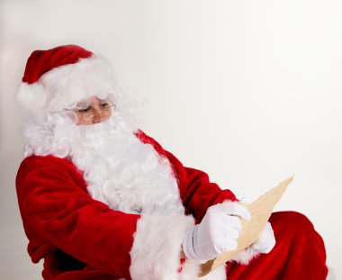 Noel Baba holding boş kağıt