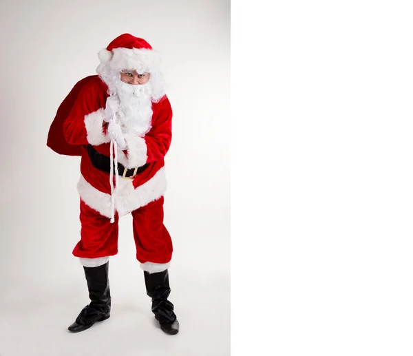 Santa claus met leeg bord — Stockfoto