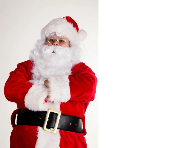 Santa claus met leeg bord — Stockfoto