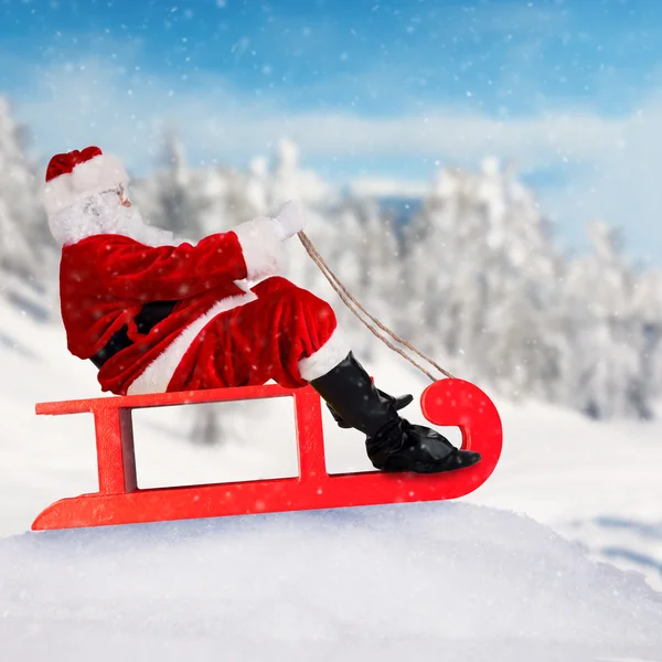 Santa Claus on sledge — Stock Photo, Image