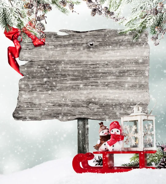 Empty wooden sign in winter mood