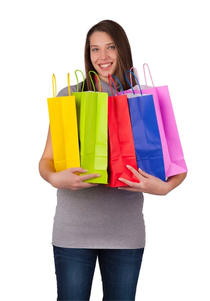 Junge Frau mit Einkaufstaschen — Stockfoto