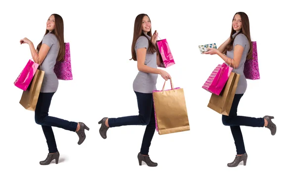 Jeune femme avec des sacs à provisions — Photo