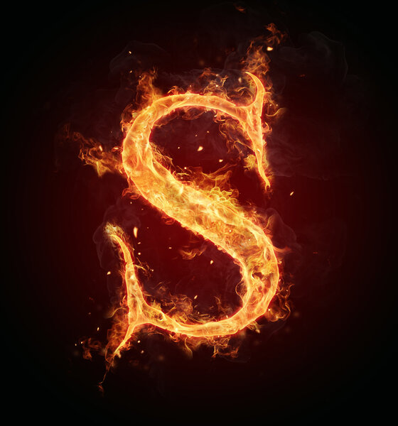 Огненная буква на черном фоне
