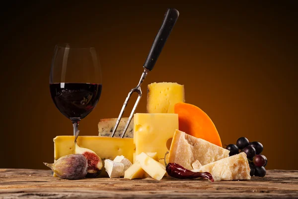 Various kind of cheese with wine