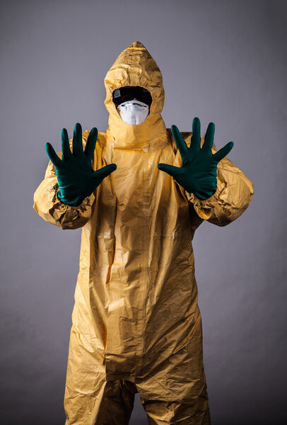 Laboratory man in chemical protective dress