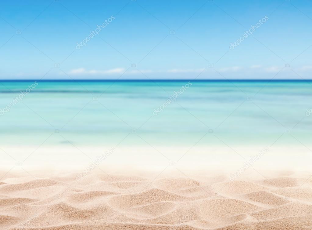 Empty sandy beach with sea