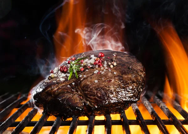 Beef steak on grill — Stock Photo, Image