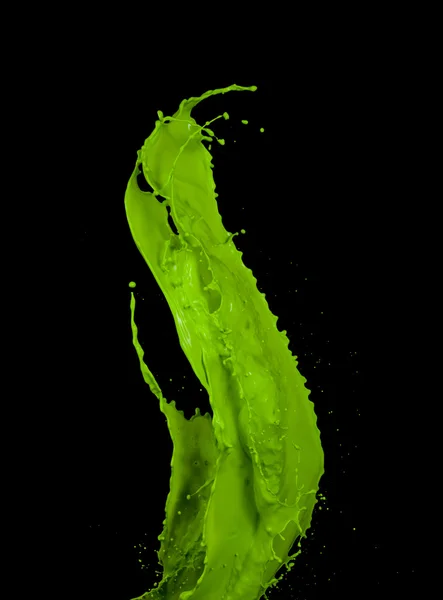Zielona farba splash na czarnym tle — Zdjęcie stockowe