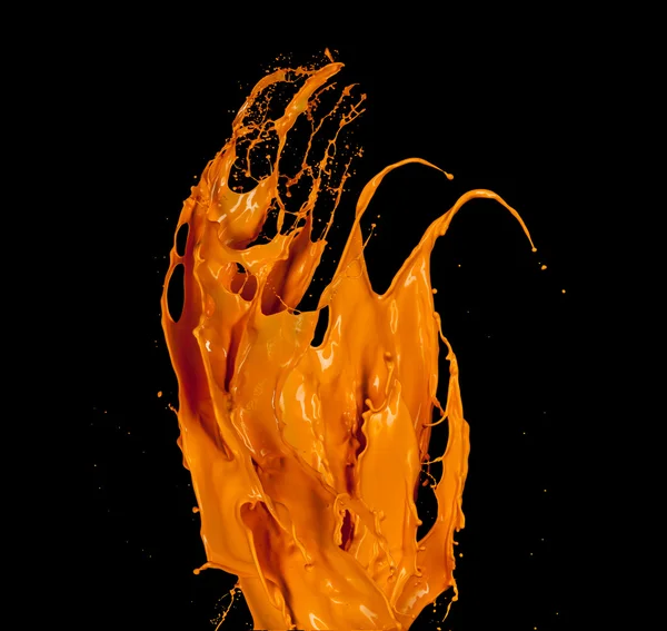 Vernice arancione spruzzata su sfondo nero — Foto Stock
